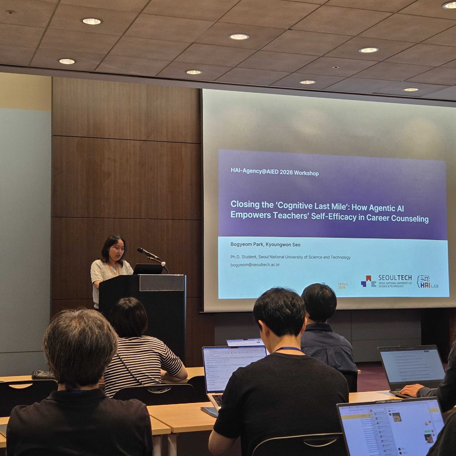 Bogyeom Park and Dongyub Lee presented at a workshop at AIED 2026